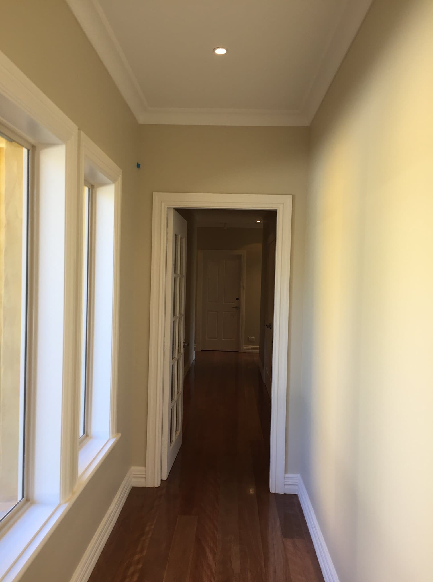 Hallway with French doors repainted in cream, Central West NSW